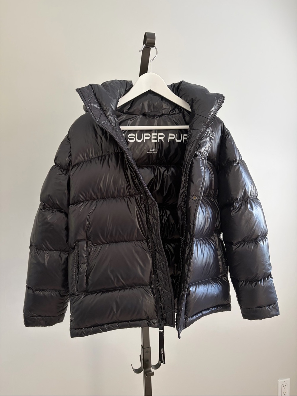 TNA The Super Puff Hi-Gloss Black Puffer Jacket, Size 2XSmall.